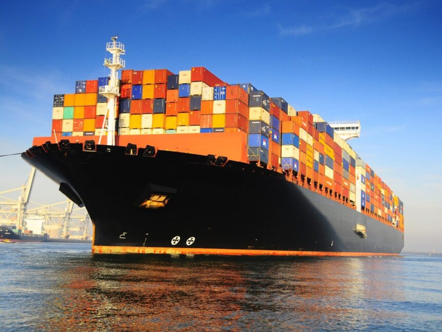 orange black loaded container ship harbour 1950x1463 1